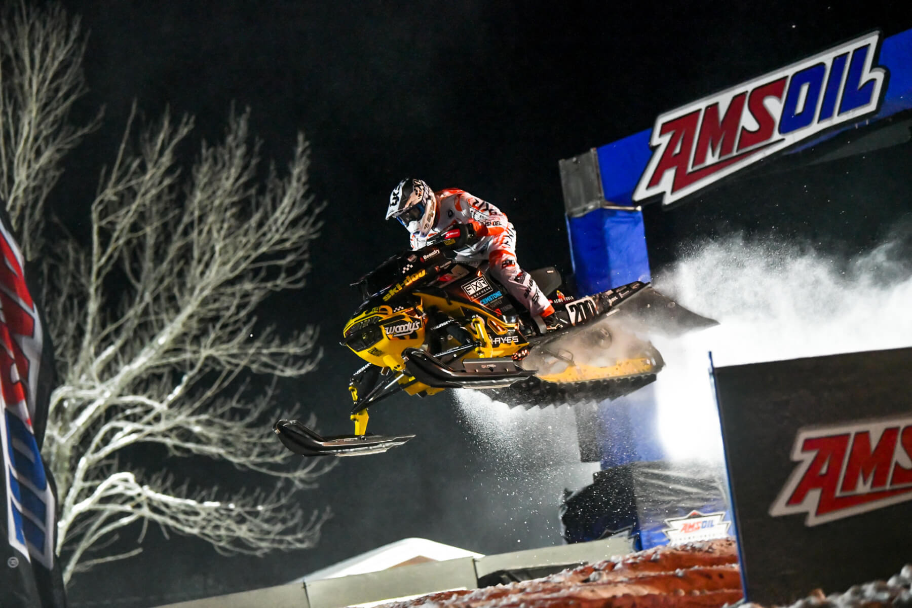 Snowmobile racer jumping during the AMSOIL Mt. Zion Snocross National