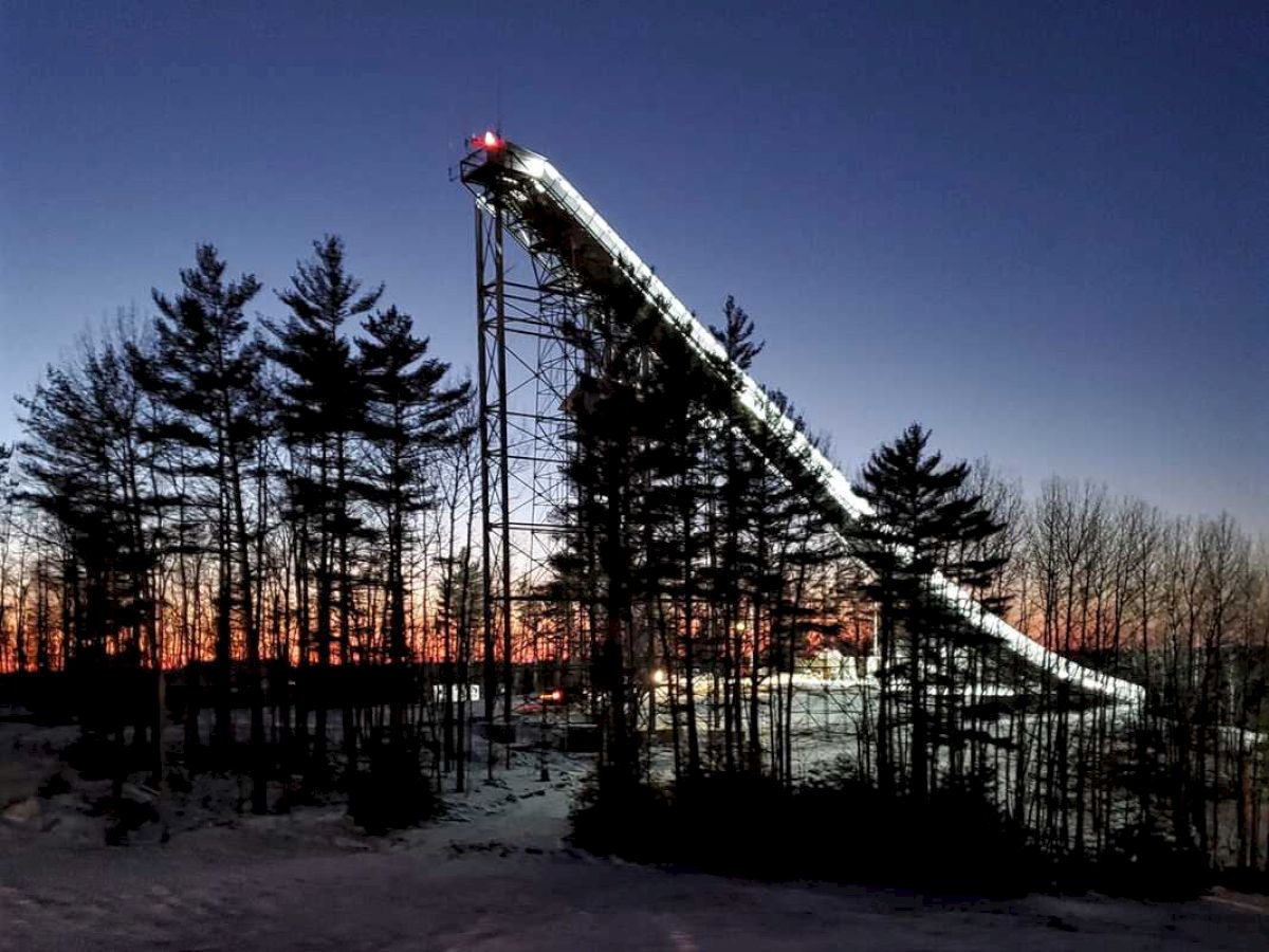 Pine Mountain Ski Jump illuminated at night in Iron Mountain